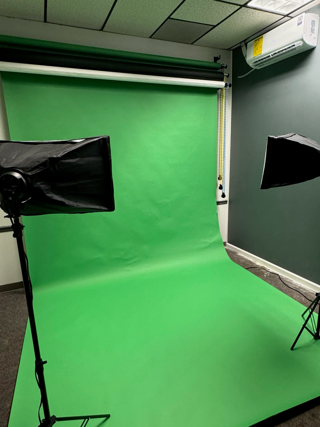 PAD Studios Media Room at PAD 2 featuring green screen backdrop with photo and video production equipment